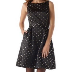 White House Black Market women shiny black sleeveless dress with gold polka dots